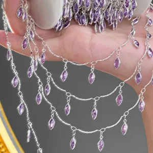 Detail view of DIY copper chain with light purple marquise zirconia pendants for necklaces.