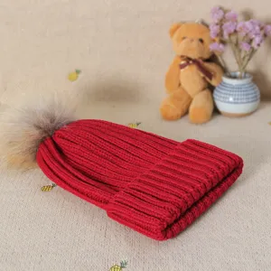 Women thick winter knitted hat with plush pom pom, cozy warm beanie for cold weather daily wear.