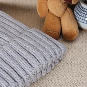 Grey ribbed knit winter beanie hat, thick and warm woolly cap for women daily cozy wear.