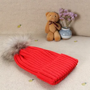 Women winter red knitted beanie hat with fluffy fur pompom warm thick casual stylish daily wear