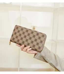 Women's brown monogram print long zipper wallet clutch, retro PU leather purse with card slots.