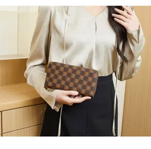 Fashionable women's long checkered clutch wallet, stylish and elegant daily commuter handbag.