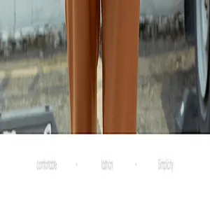 Detail shot of stylish brown trousers, comfortable fit and casual daily wear style.