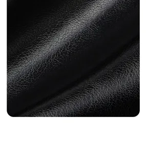Black faux leather fabric material close-up texture detail for women handbag style.
