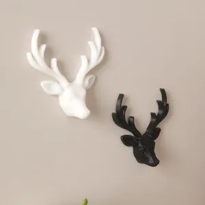 Miniature tête de cerf support mural rétro sculpture déco pour la maison et le salon.