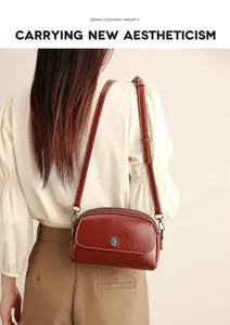Retro oil wax leather crossbody shoulder bag for women, multi-compartment shell bag detail.