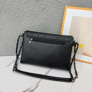 Women's black punk style skull embossed chain envelope bag, stylish single shoulder crossbody bag.