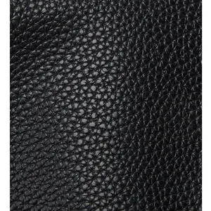 Close-up detail of black lychee pattern leather material showing fine texture and grain quality.
