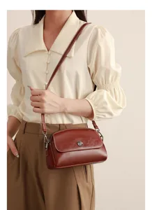 Retro oil wax leather women crossbody bag vintage shell shoulder bag with metal lock.