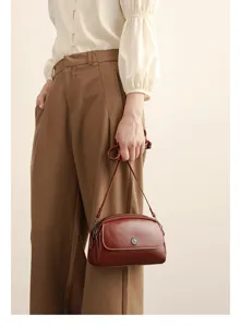 Vintage oil wax leather shoulder bag for women, multi-compartment casual crossbody purse.