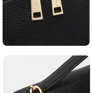 Black litchi grain shoulder bag detail showcasing premium golden hardware zippers and rings.