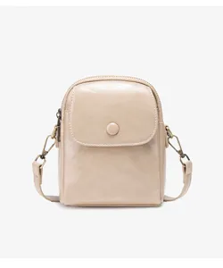 Small beige crossbody phone bag for women, stylish square shoulder bag with flap and button closure.