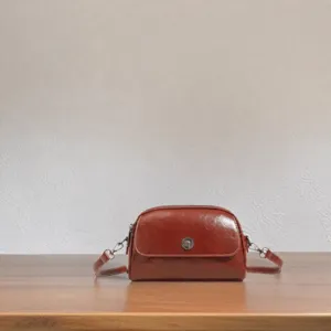 Vintage oil wax leather crossbody bag, stylish retro shoulder shell bag for women main view.