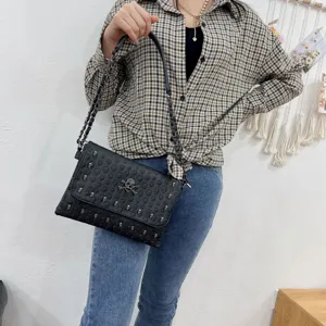 Punk style skull embossed chain envelope bag detail, stylish shoulder crossbody women bag.