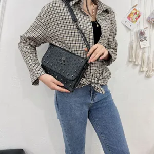 Punk style black skull chain envelope shoulder bag detail showing stylish design for women.
