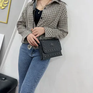 Stylish punk style black leather skull studded chain envelope shoulder bag for daily women.