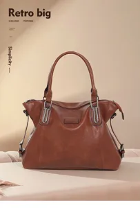 Retro large capacity brown leather tote bag, stylish commuter shoulder bag for women daily use.