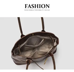 Detailed view of vintage brown leather tote bag interior with multiple compartments and handles.
