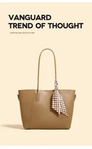 Stylish women's large capacity tote bag with chic scarf accessory for casual daily use.