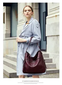 Vintage women's burgundy shoulder bag retro tote handbag with multi-zip pocket design.