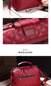 Red quilted boston handbag with top handle, premium leather material and secure metal lock.