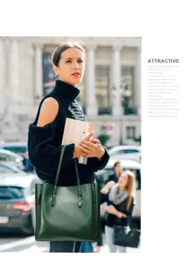 Detail view of dark green oil leather tote bag, showcasing large capacity and stylish design.