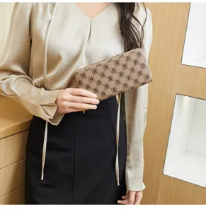 Brown monogram print long wallet detail view, women zipper clutch purse for daily commuting.