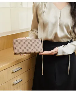 Elegant brown monogram long zip wallet, chic fashion commuter clutch purse for women.