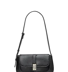 Black vintage shoulder bag with metal turn-lock closure and white contrast stitching details.