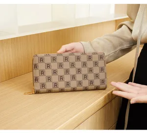 Women fashion clutch wallet with classic checkered print design and smooth zipper closure.