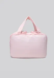 Close-up detail of the pink portable cosmetic pouch zipper and durable handle design.