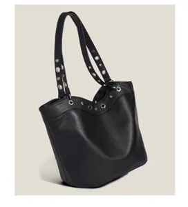 Black litchi pattern leather shoulder bag detail, stylish bucket tote with metal eyelet straps.