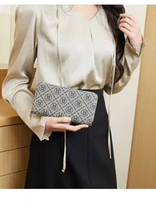 Chic monogram clutch purse for women, stylish zip wallet for daily commute and evening social events.