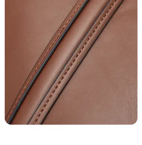 Close up view showing the detailed stitching and premium brown leather texture of the tote bag.