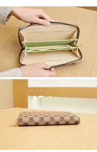 Detailed view of women's long zipper clutch wallet with chic monogram print, multiple card slots.