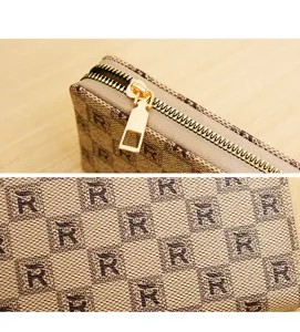 Detailed close-up shot of checkerboard monogram clutch wallet zipper and pattern texture