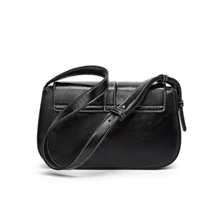 Vintage black leather saddle bag for women, stylish crossbody purse with contrast stitching.