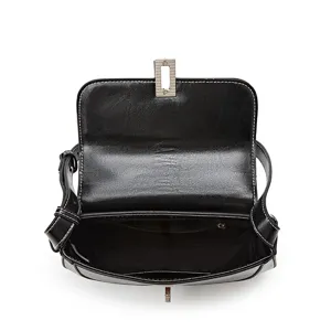 Vintage black leather saddle bag women shoulder crossbody bag with silver lock closure main view