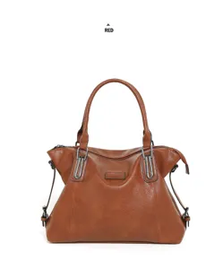 Brown leather tote bag detail, featuring durable handles and metal hardware fittings.