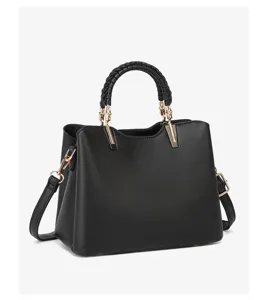 Classic black leather handbag with braided handle and gold hardware, perfect for daily commuting.