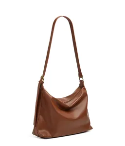 Detailed view of the stylish brown leather shoulder bag, showcasing premium texture and design.