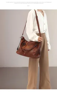 Detailed view of the retro brown leather tote bag, showing large capacity and shoulder strap.