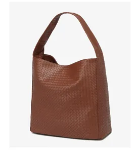 Brown woven leather shoulder bag detail, elegant hobo design with spacious interior for women.
