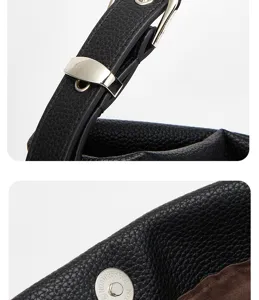 Close-up detail shot of black faux leather shoulder bag strap and magnetic hardware.