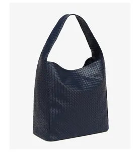 Dark blue woven leather shoulder bag, stylish large capacity underarm handbag for women.
