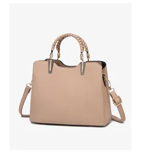 Elegant beige women handbag with braided handles, versatile shoulder bag for daily commute.