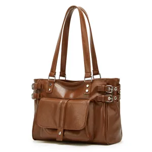 Brown PU leather large capacity commuter tote shoulder bag with side buckles and front pocket.
