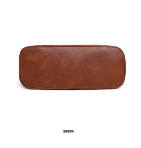 Retro bucket bag bottom detail view in brown leather style, simple and versatile commuter handbag.