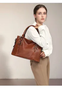 Detailed view of the brown retro PU leather tote bag, showcasing fine stitching and accents.