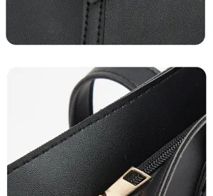 Detalle de bolso tote de cuero negro que muestra costuras finas y cremallera dorada.